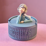 Daydream girl covered resin ashtray with blue base and decorative tabletop design