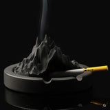 Black mountain cement ashtray with smoke rising