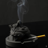 Dragon-inspired cement ashtray with smoke rising from vent