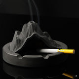 Mountain-profile cement ashtray with smoke effect