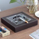 glass ashtray with leather case on desk setup lifestyle