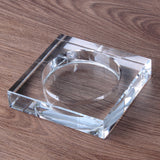 clear square glass ashtray close up detail